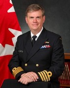 Capitaine de vaisseau Chris Dickinson